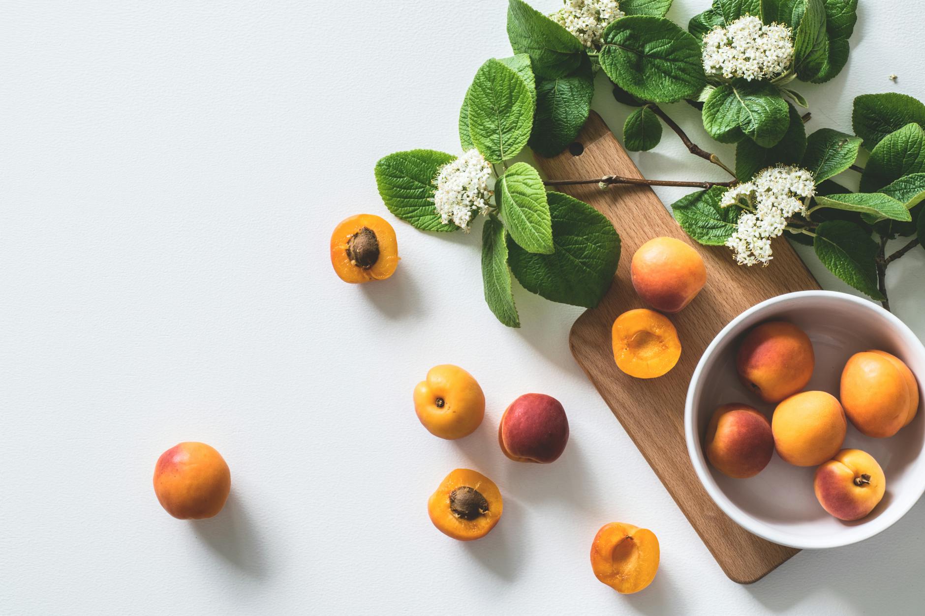 apricot fruits on bowl